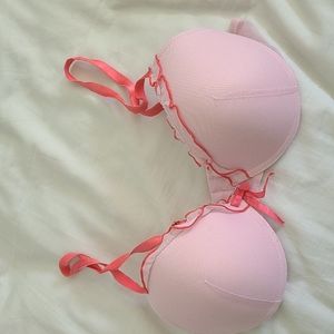 Light pink 34B bra with ruffle trim